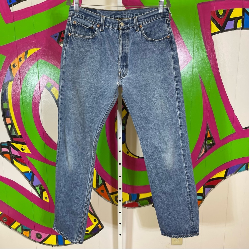 Levi's 501xx, 5 Button Fly, 35x36. Good used condition. Hole in the crotch.